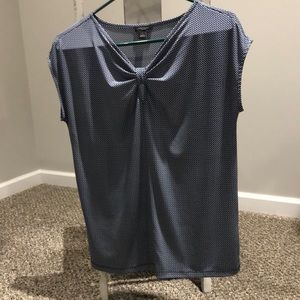 Size small Ann Taylor blouse!  95% polyester, 5% spandex. Navy blue and cream